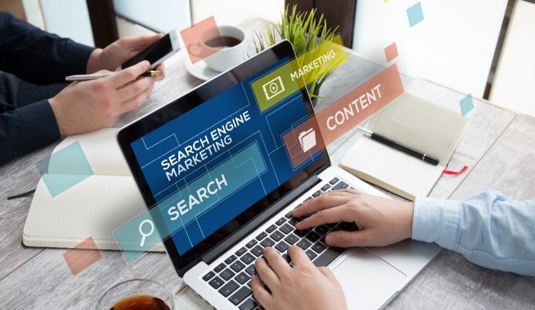 A man working on a laptop showing Search Engine Marketing for Web Designer Directory Backlinks for SEO