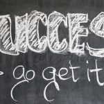 a word "success go get it" written in chalk portraying that marketing success is by learning SEO