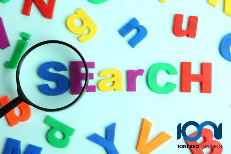 group of letters scattered with magnifying glass on word SEARCH promoting the big truth behind search intent and keywords - SEO training